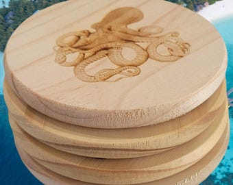 May include: Set of four wooden coasters featuring a laser-engraved design of an octopus. The coasters are stacked on top of each other, with the top coaster showing the octopus design.