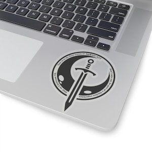 May include: A black and white sticker featuring a sword and a crescent moon. The text reads "Tune into the final season of MOONCAST. Only on LifeStream VR. Don't miss out, be part of a timeless experience."