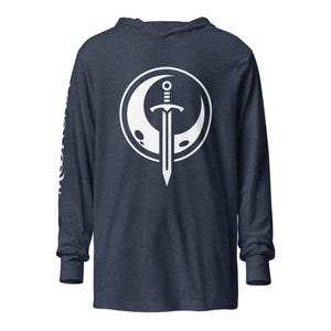 May include: A navy blue long-sleeved hoodie with a white graphic of a sword inside a crescent moon.