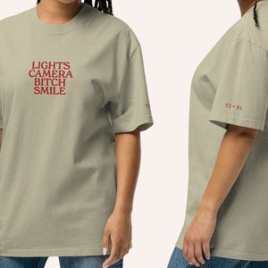 Lights Camera Smile (I can Do It With a Broken Heart) Oversized faded t-shirt with embroidery detail