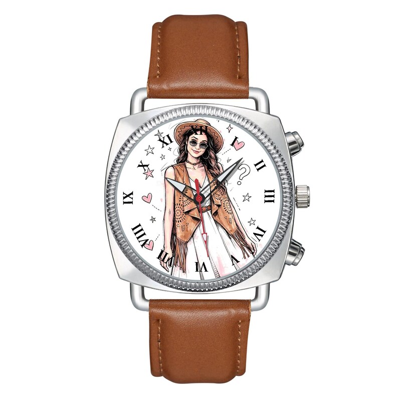 May include: A wristwatch with a brown leather strap and a silver-toned square case. The white watch face features a central illustration of a person wearing a hat and vest, surrounded by Roman numerals, small pink hearts, and star icons.
