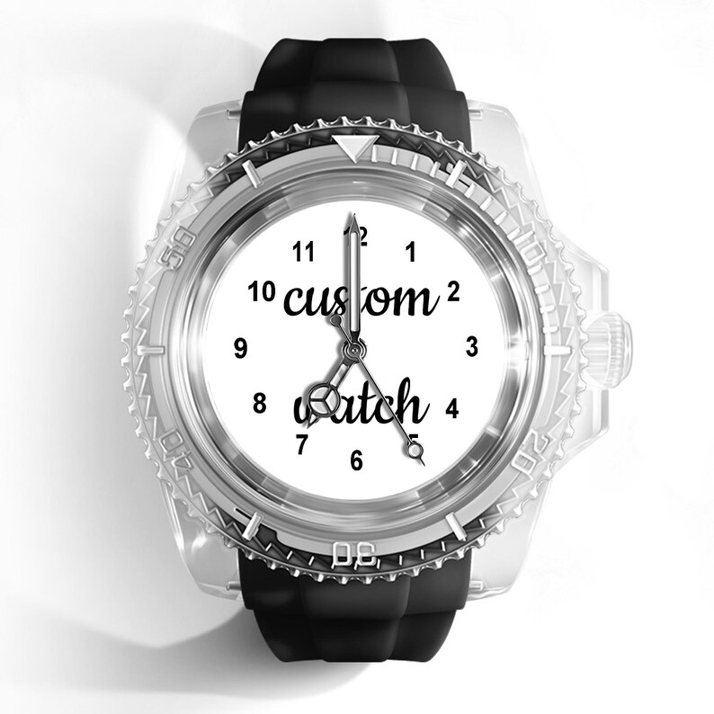 May include: A wristwatch with a black silicone strap and a clear, transparent casing. The white watch face features black Arabic numerals from 1 to 12 and the text "custom watch" in a black script font, with silver-toned hour, minute, and second hands.