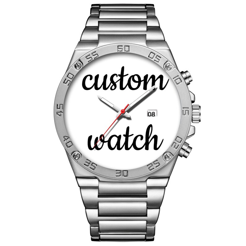 May include: A silver-toned stainless steel wristwatch with a white dial featuring the black text custom watch. The watch has a metallic link band, a date window at the three o'clock position, and silver hands with a thin red second hand.
