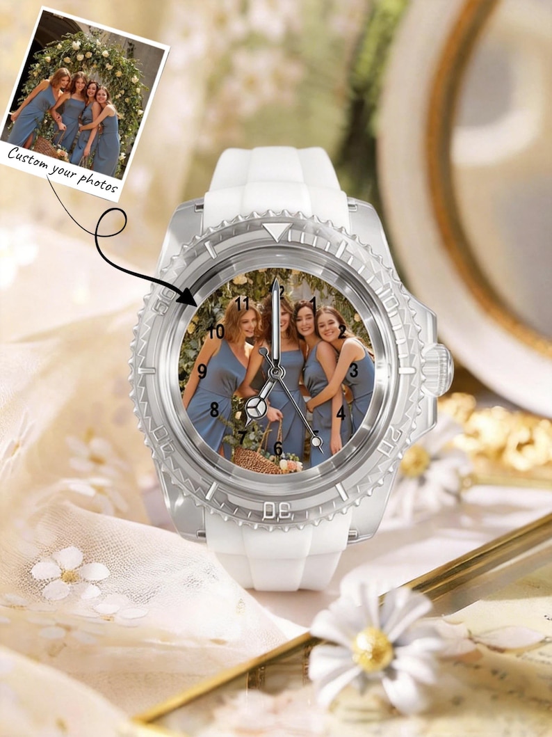 May include: A wristwatch with a white silicone strap and a silver-toned bezel featuring a custom photograph on the dial. The watch face displays a group of four people in blue dresses and includes black hour markers and silver hands. Text reads Custom your photos.
