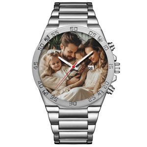 May include: A silver-tone analog wristwatch featuring a metal link band and a circular bezel with engraved minute markers. The watch face displays a custom photographic print of a family of four, with white hour and minute hands and a red second hand.