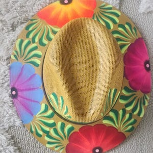 Camrl tan straw hat with vibrant  multi color flowers