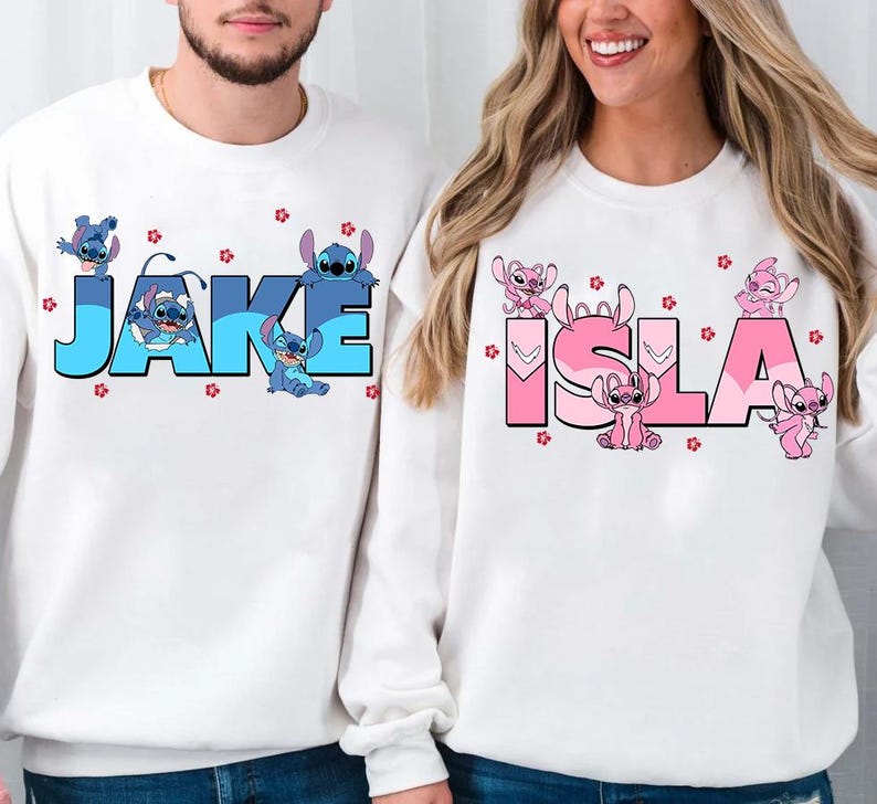a man and a woman wearing matching sweatshirts
