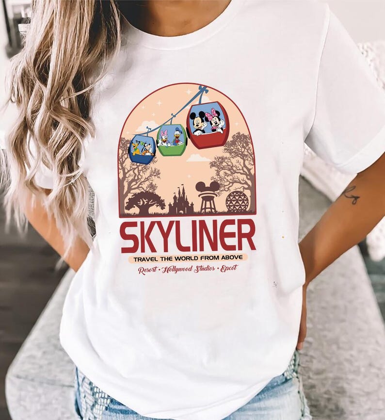 a woman wearing a white skyliner t - shirt