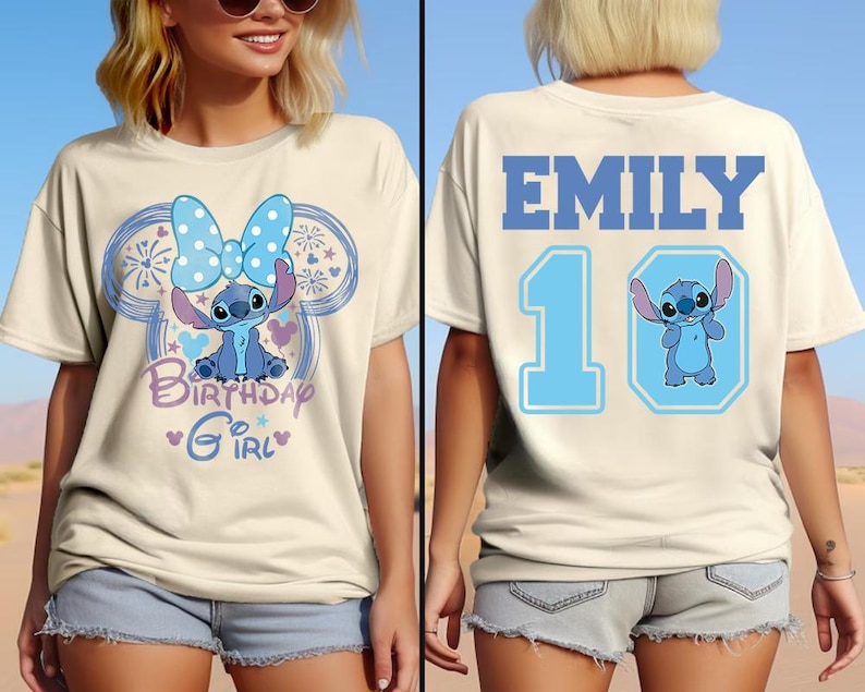 May include: Cream-colored t-shirt featuring a cartoon character design. The front displays a blue character with a bow, the text "Birthday Girl", and a Mickey Mouse-inspired outline. The back has the name "EMILY", the number "10", and the same character.