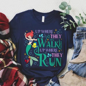 a t - shirt that says, up where they walk up where they run