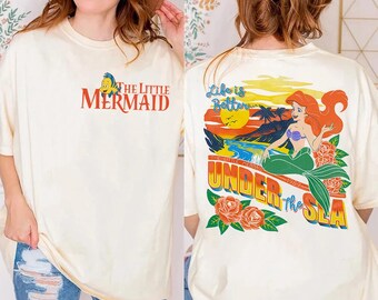 Maglietta bifacciale Disney "La Sirenetta: la vita è migliore sotto il mare", colori comfort, maglietta della principessa Ariel, "Fiorella", Magic Kingdom Disneyland