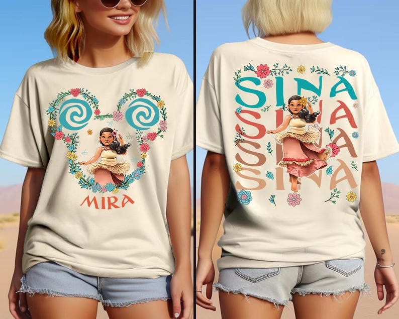 A woman wearing a white t-shirt with a Disney character design and text on the back.
