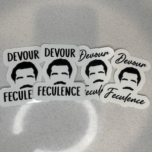May include: Four black and white stickers with a cartoon illustration of a man with a mustache. The stickers say "Devour" and "Feculence".