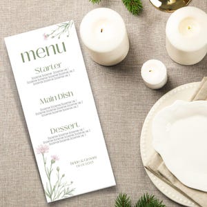 May include: A white menu card with a green floral design and the word "menu" in a green font. The menu includes sections for starter, main dish, dessert, and a note at the bottom that says "Bride & Groom 01.01.2025".