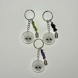 Suicideboys G59 Skull Logo Circle Resin Keychain; Amethyst, Peridot or Onyx Gemstones; Transparent Image, Circle Resin Charm, Grey59