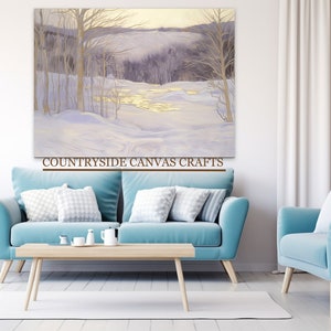 Puede incluir: Una pintura de un paisaje invernal nevado con un arroyo que lo atraviesa. Los árboles están desnudos y el cielo es de un azul pálido. La pintura está enmarcada y colgada en una pared de una sala de estar.