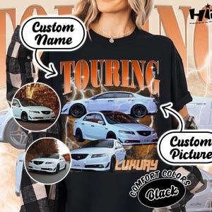 May include: Black t-shirt with the word "TOURING" in orange, featuring images of white cars. The shirt includes the text "Custom Name", "Custom Picture", "LUXURY", "COMFORT COLORS", and "Black".