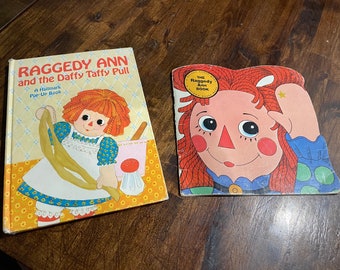 Qty of 2 1970's Raggedy Ann and Andy Booksone is a Pop up Book