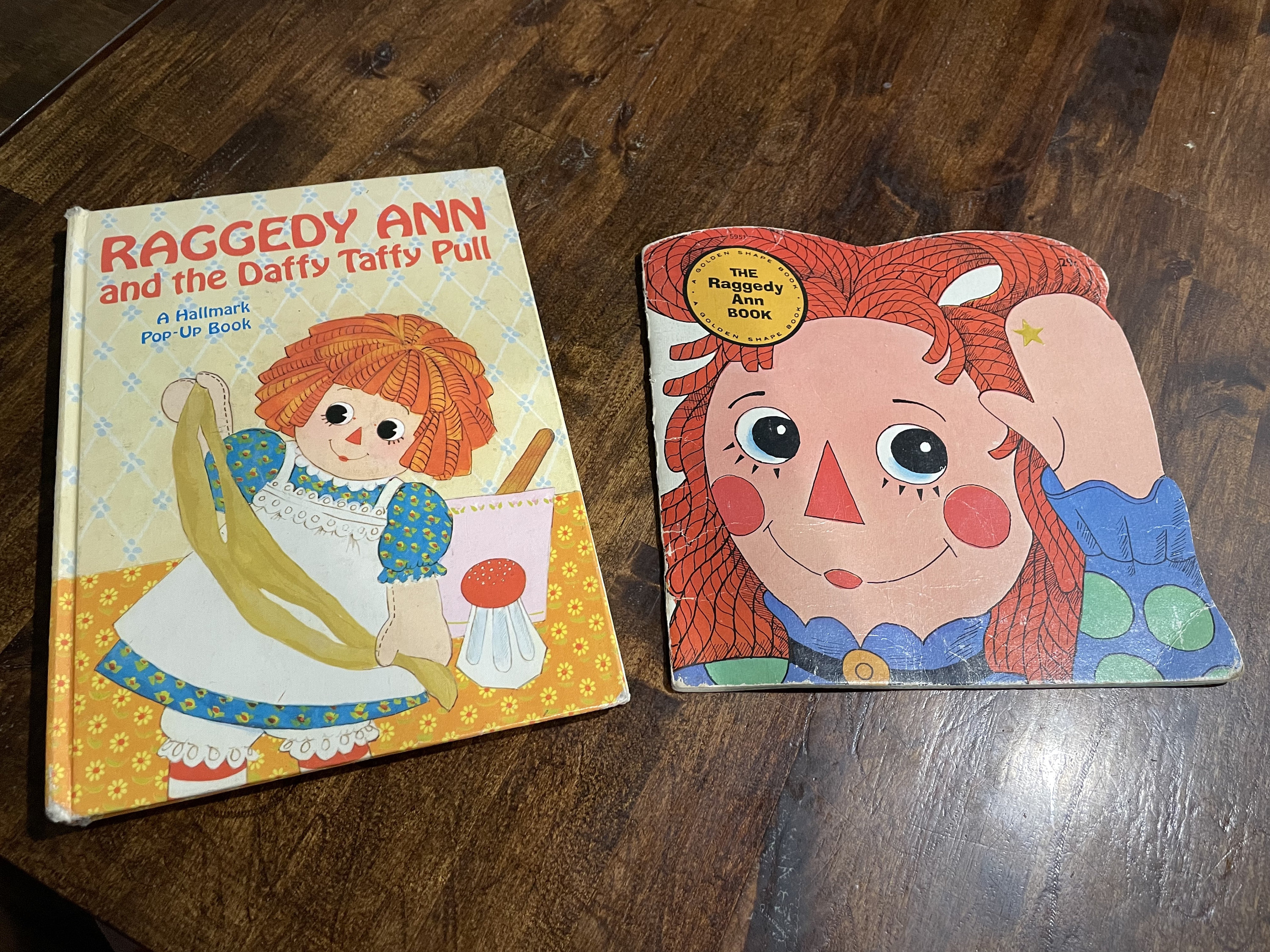 Qty of 2 1970's Raggedy Ann and Andy Booksone is a Pop up Book