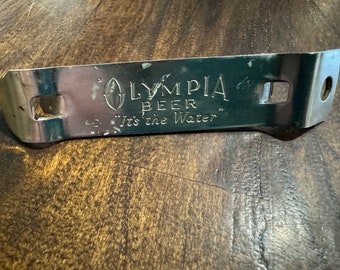 1960's Olympia Beer " It's The Water" Church Key Opener