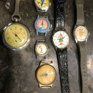 Vintage Smurf, Cinderella, Mickey Mouse, Keebler Elf, Mighty Mouse, Compass and New Haven Pedometer