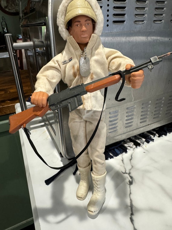 1990's 13 Inch G I Joe Soldier With Lots of Accessories and Snow