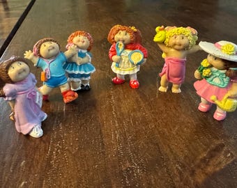 Qty of 6 1984-1985 Cabbage Patch PVC Dolls Roller Skates and More