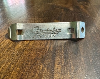 1960's Rainier Beer Church Key Opener