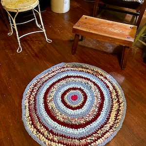 Handmade Farmhouse Rag Rug 34 Inch Diameter Reds, Blues and Mauves etc.