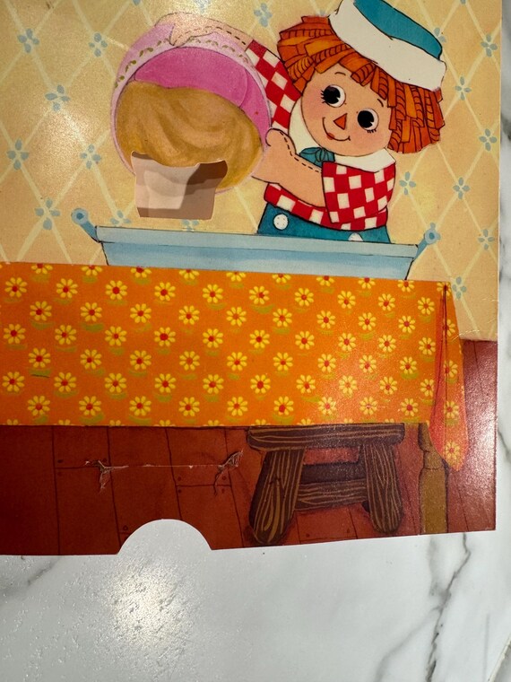 Qty of 2 1970's Raggedy Ann and Andy Booksone is a Pop up Book