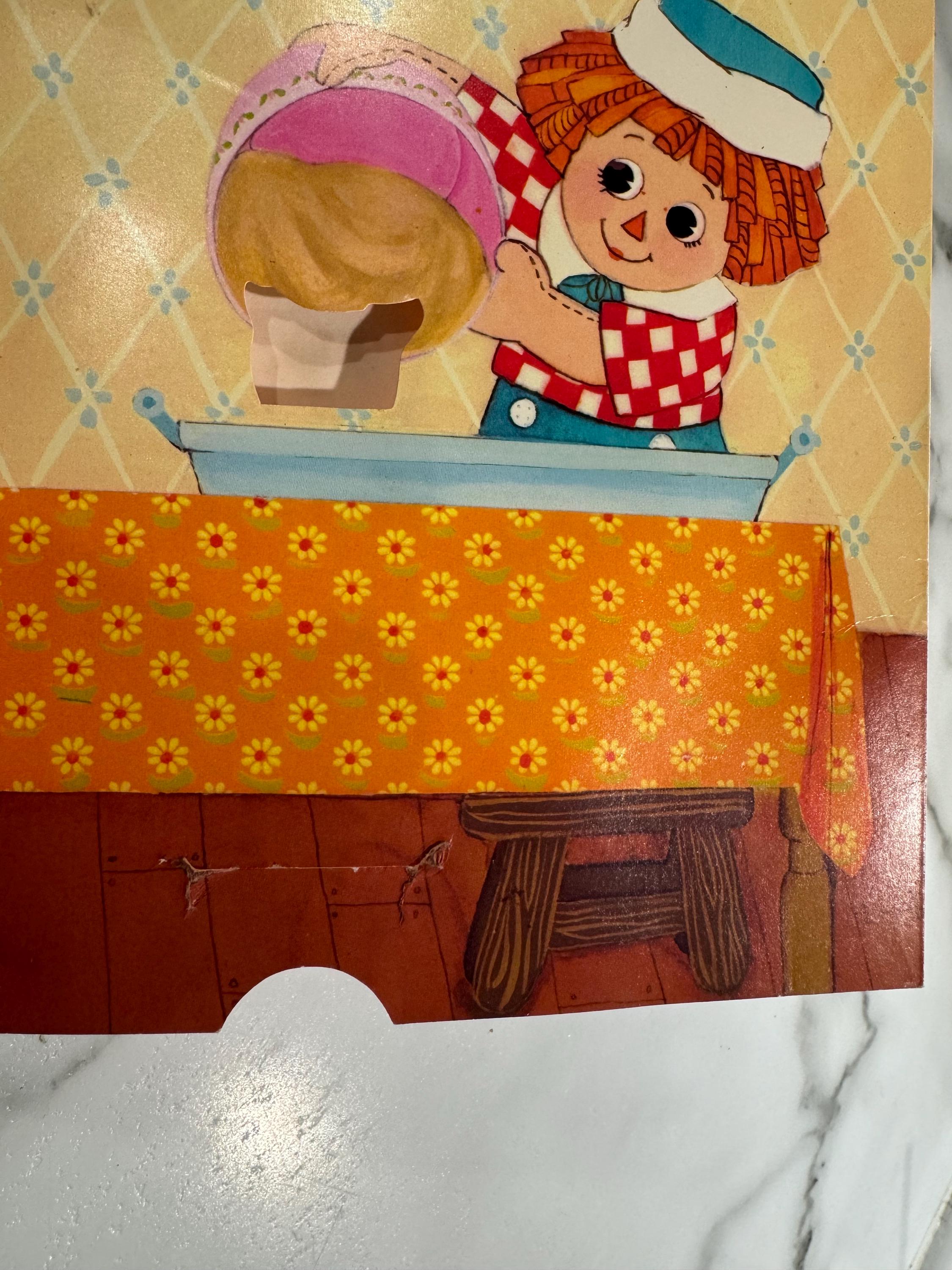 Qty of 2 1970's Raggedy Ann and Andy Booksone is a Pop up Book