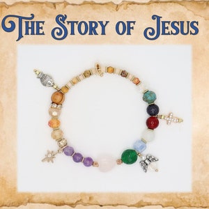 May include: A colorful beaded bracelet with charms, including a cross, a star, a fish, and an angel. The beads are made of wood, stone, and glass. The bracelet is a religious themed jewelry piece.