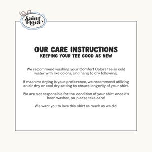 May include: A white card with the text "OUR CARE INSTRUCTIONS KEEPING YOUR TEE GOOD AS NEW". The text recommends washing the Comfort Colors tee in cold water with like colors and hang to dry. It also mentions machine drying.