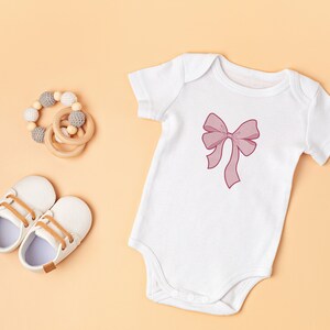 Blue Onesie with Bow Embroidery