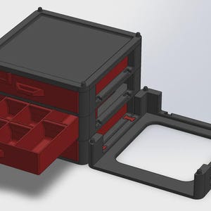 May include: A black and red modular storage system with multiple drawers and compartments. The drawers are red, and the frame is black. One drawer is open, revealing several compartments. The system is designed to be stackable.