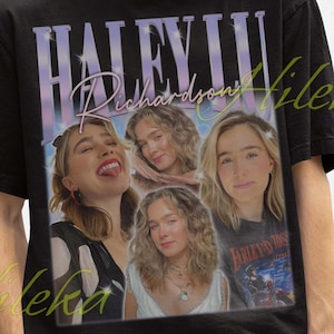 May include: Black t-shirt featuring a graphic of a person with the text "HALEY III Richardson" in a vintage style. The shirt is worn by a person wearing a black bucket hat.