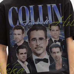 May include: Black t-shirt featuring a collage of images of Colin Farrell with the name "COLLIN" in large, stylized text. The shirt is worn by a person wearing a black bucket hat.