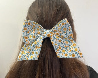 Anaïs - Barrette nœud en coton fleuri bleu et orange upcyclé fabriquée à la main en France