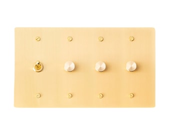 Retro toggle, dimmer outlet with decorative brass wall plates