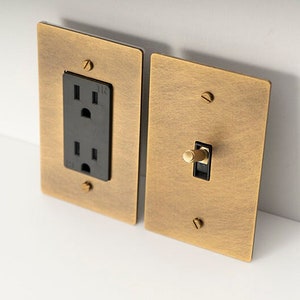 Electrical Outlet, Toggle Light Switch, Dimmer - Aged Brass Wall Plate