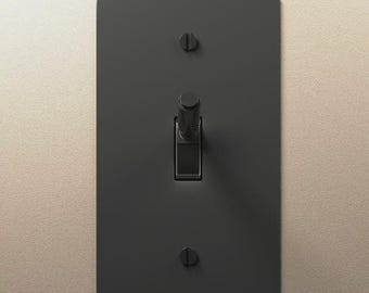 Black toggle Switch with solid Brass Wall Plate