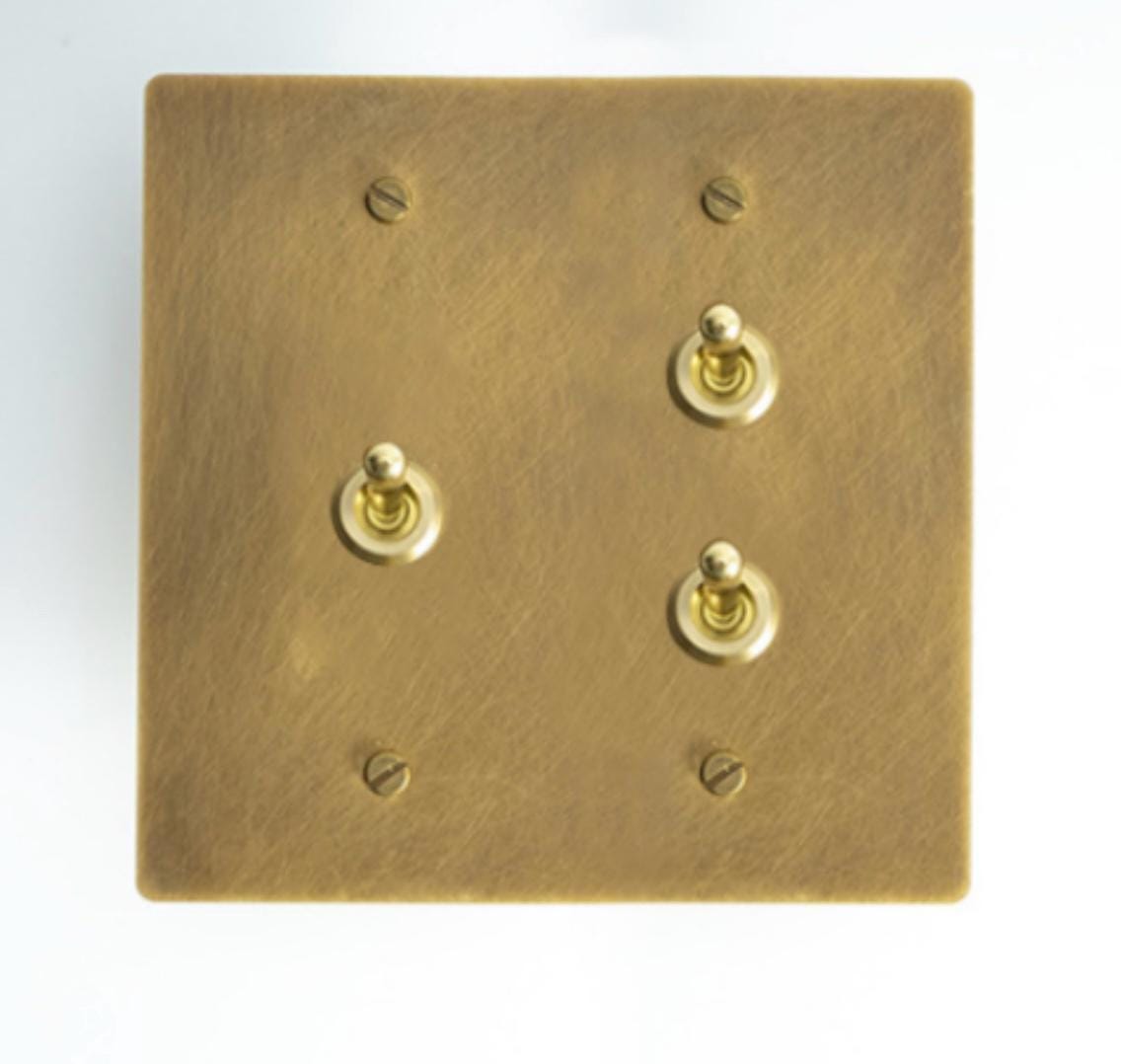 2 gang Brass Face plate with 3 toggle switches