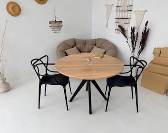 Round Solid Wood Dining Table with Black X Base Scandinavian Modern Pedestal Design
