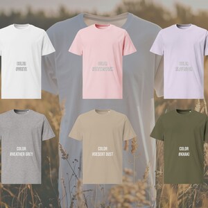 Es sind 6 T-Shirts abgebildet. Oben sind dies: weiss, pink und lavendel.
Unten sind dies: grau, sandfarben und khaki.