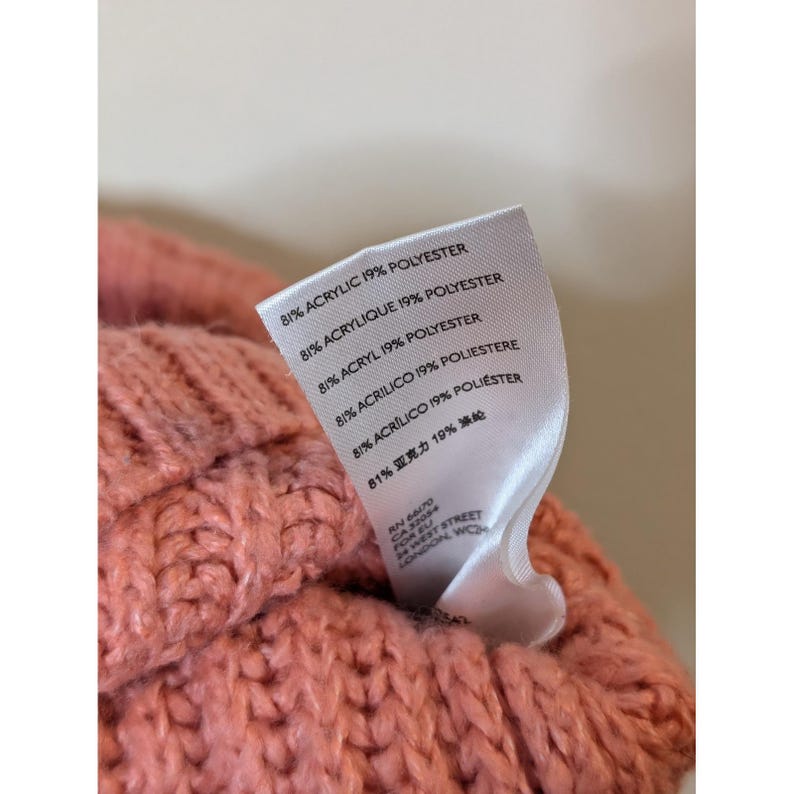 Suéter rosa de cuello alto corto con mangas abullonadas de Urban Outfitters, talla pequeña. imagen 4