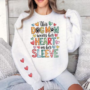 This Dog Mom Wears Her Heart on Her Sleeve Png, Dog Paw Png, Custom Dog Name Png, Shirt Mom Dog Mama Png, Dog Lover Sweatshirt Png