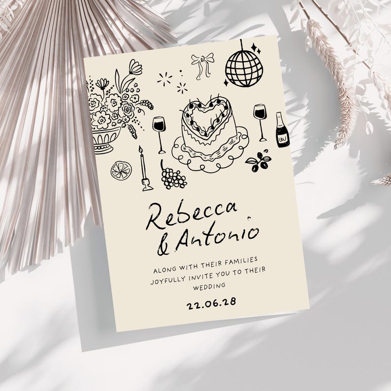 K&ouml;nnte beinhalten: Eine cremefarbene Hochzeitseinladungskarte mit schwarzen Strichzeichnungen eines herzf&ouml;rmigen Kuchens, einer Discokugel, Blumen, Weingl&auml;sern und einer Flasche. Der Text lautet Rebecca & Antonio along with their families joyfully invite you to their wedding 22.06.28.