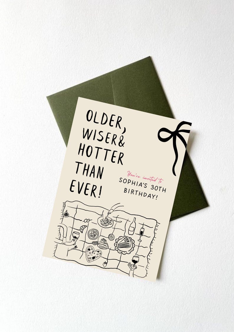 May include: A beige card with black text that reads "Older, Wiser & Hotter Than Ever!" and "You're invited to Sophia's 30th Birthday!"  The card features a black and white illustration of a picnic blanket with food and drinks.