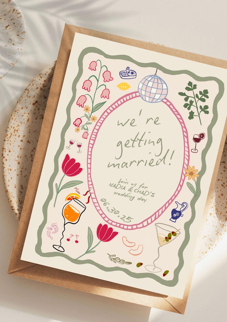 May include: A cream-colored wedding invitation card with a wavy green border, featuring illustrations of a disco ball, flowers, cocktails, and shrimp. The text reads: we're getting married! Join us for NADIA & CHAD'S wedding day 06.30.25.