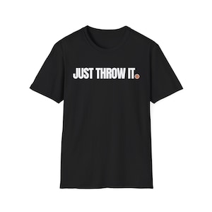 May include: Black t-shirt with white text that reads "JUST THROW IT." and a small orange basketball graphic.